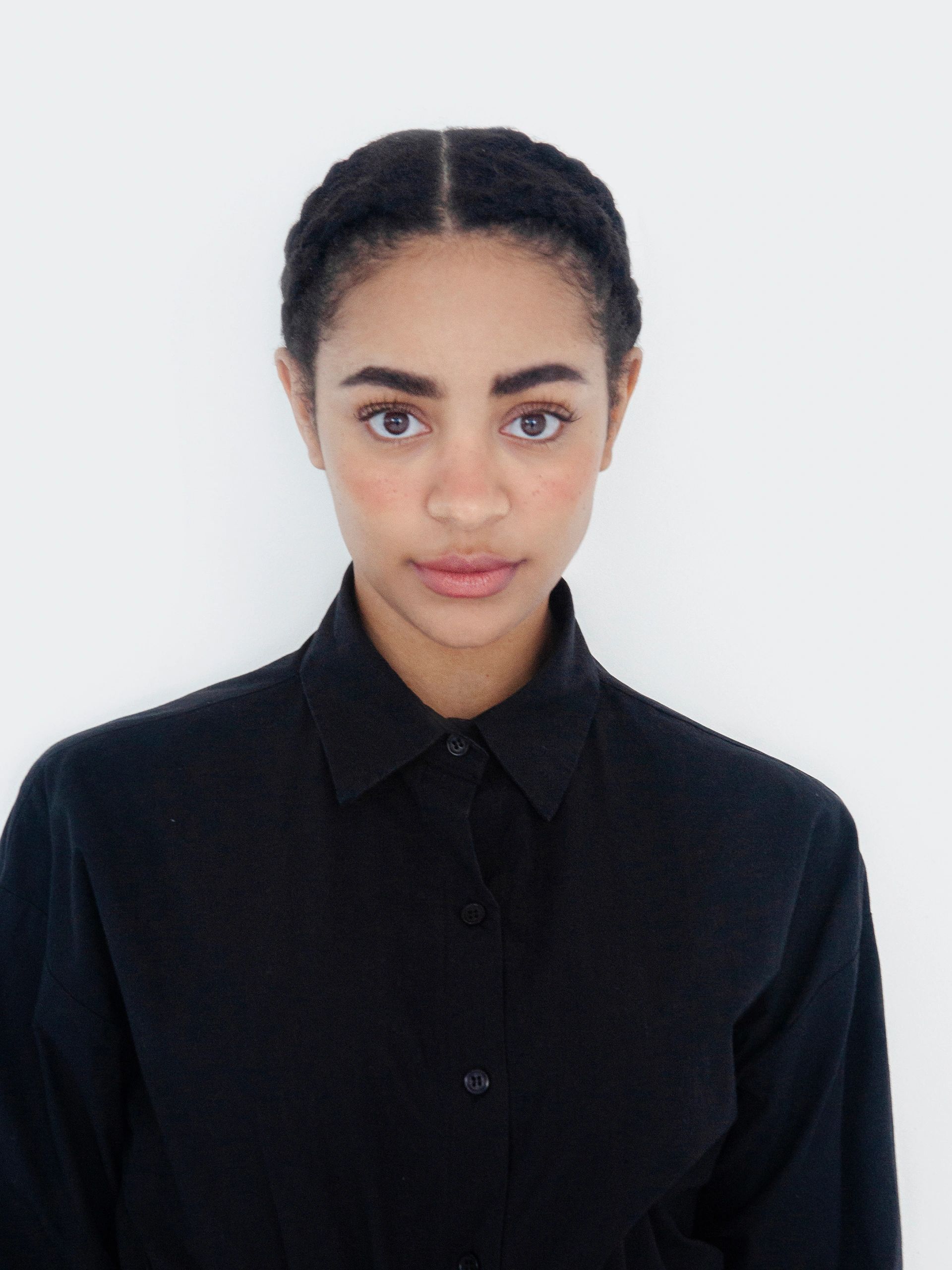 Portrait of a young woman representing the KIKA team